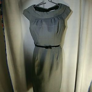 Knee length black and white fitted dress